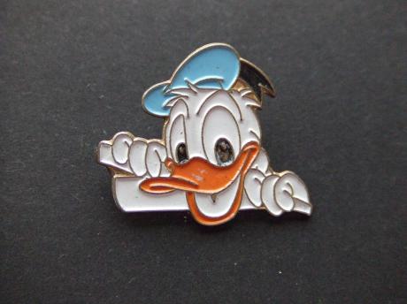 Donald Duck kijkt over de schutting